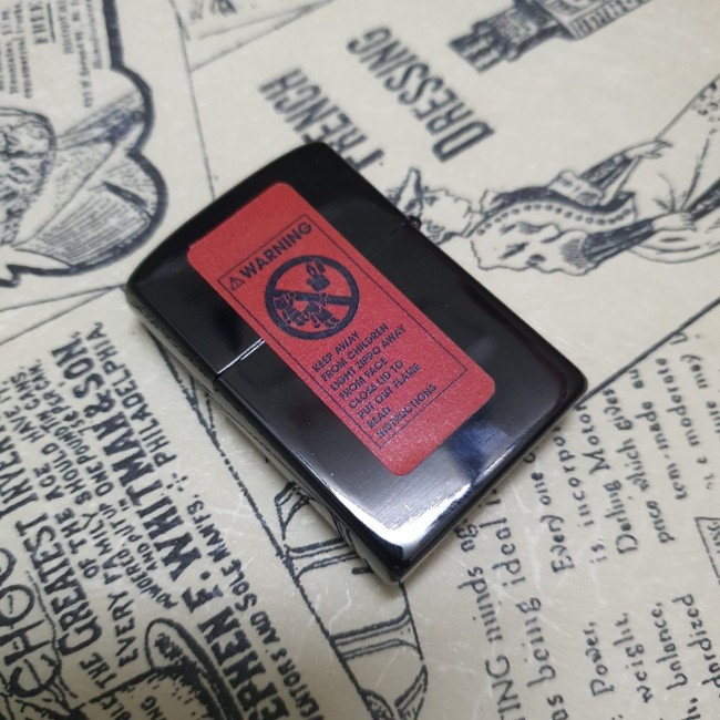 Bật Lửa Zippo Kỷ Niệm 65 Năm Đen Bóng Đời La Mã E2000-XVI ( Có Tem Đỏ )
