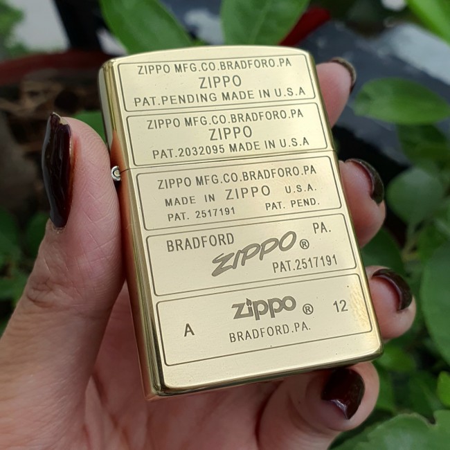 Bật Lửa Zippo Mỹ Đồng Khắc 4 Mộc Đáy Qua Các Thời Kì Đời E-XVI ( Ruột Vàng , Fullbox)